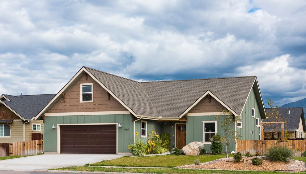 Raynor Doors for a Craftsman Exterior with a Two Bedroom and Columbia Falls Residence by Montana Heritage Home Builders Inc