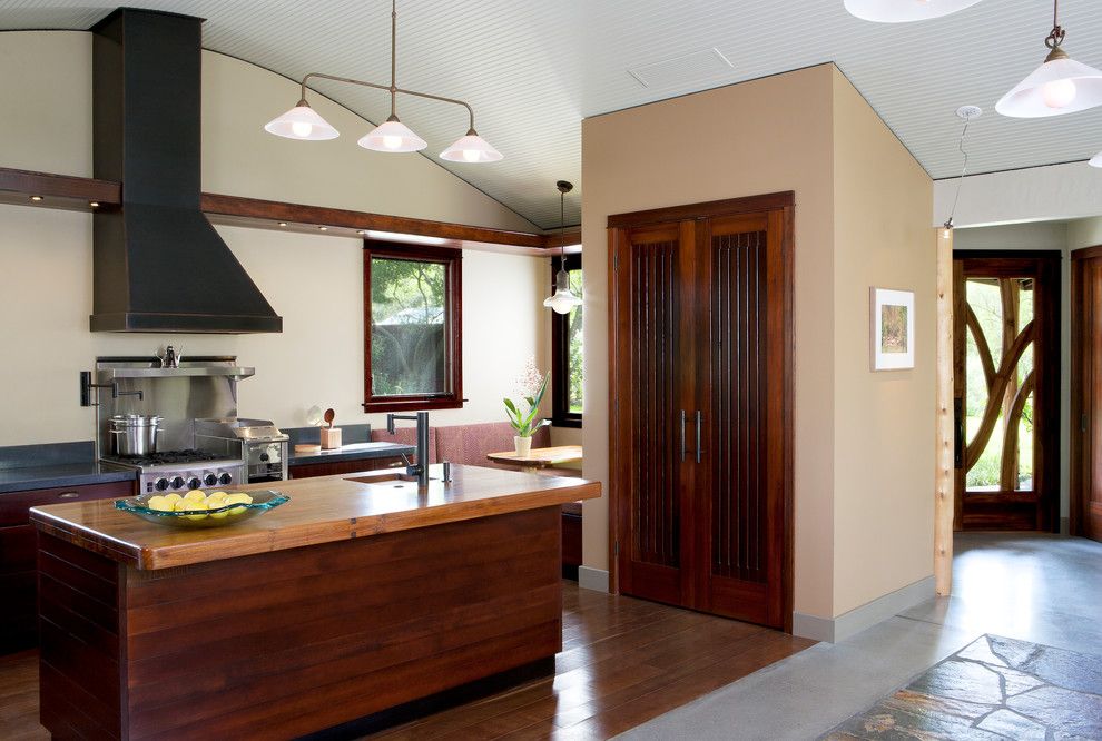 Redlands Theater for a Contemporary Kitchen with a Metal Range Hood and Baer Retreat by Osborne Architects