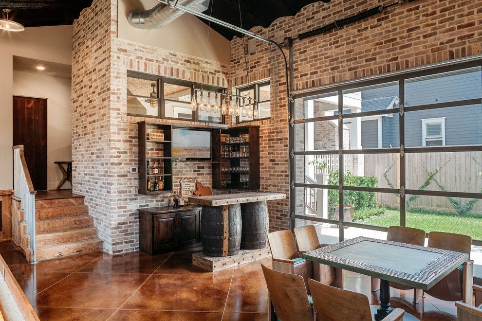 Redlands Theater for a Rustic Home Bar with a Brown Floor Tile and Whitestone Builders   Industrial Rustic Transitional by Whitestone Builders