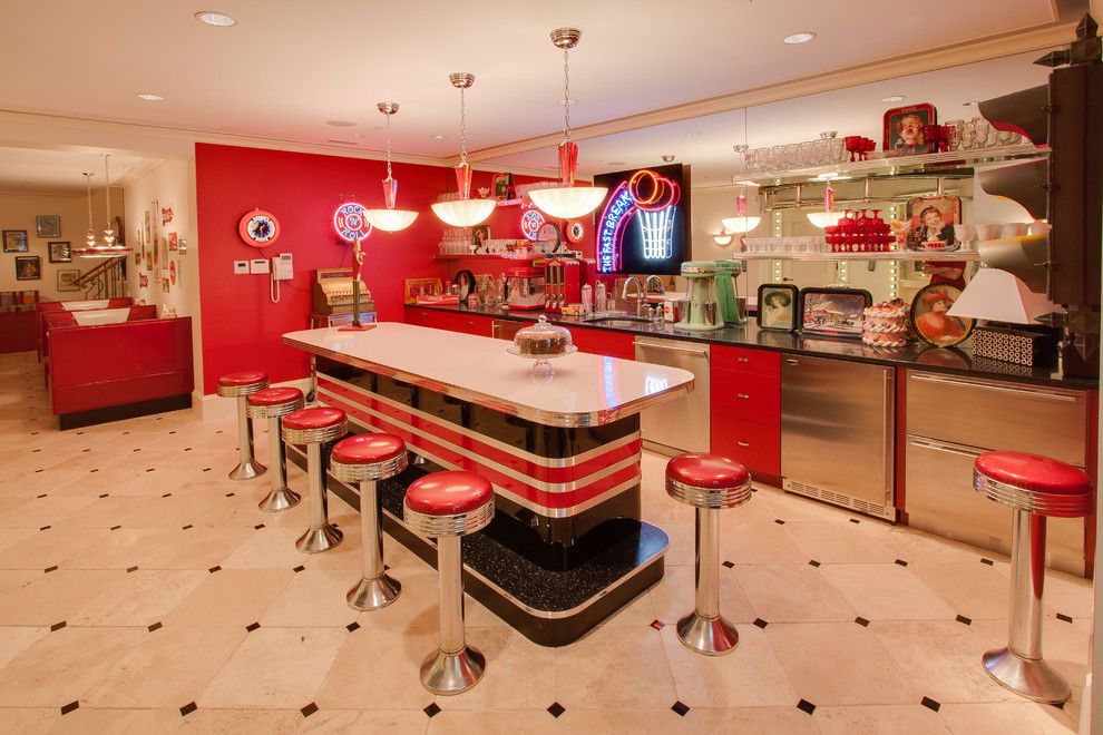 Redlands Theater for a Traditional Basement with a Red Cabinets and Bars & Wine Rooms by Heartwood Design