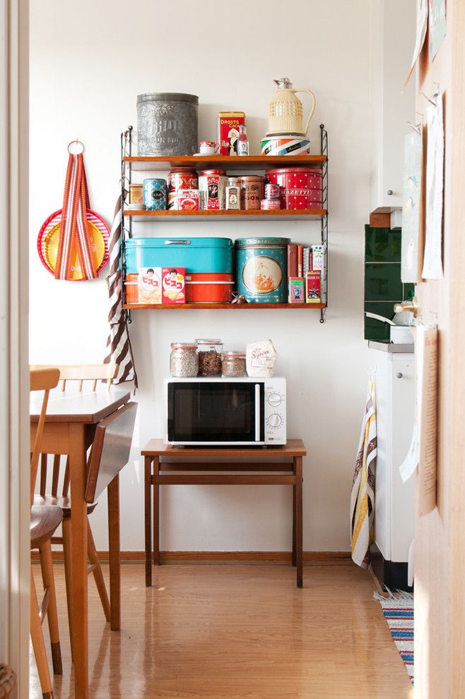 Removing Garbage Disposal for a Midcentury Kitchen with a Blankt Golv and Shabby Chic Inspirerad Kök by Blog.grahnat.se