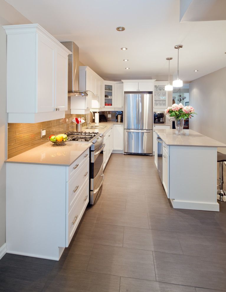 Renovator for a Contemporary Kitchen with a Mississauga Space Planning and Contemporary Kitchen Reno by Nicola Interiors