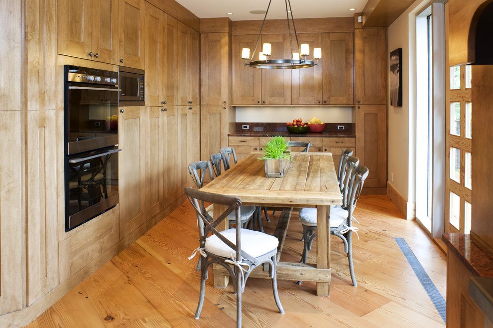 Reupholster Chair Cost for a Contemporary Kitchen with a Wood Flooring and Green House by Cr Design and Build