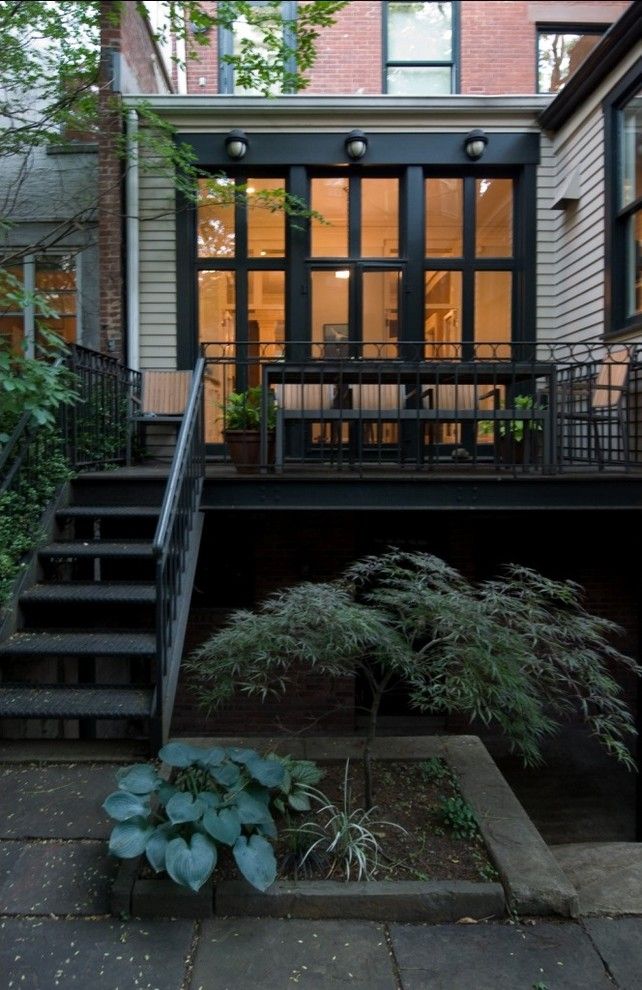 Rewiring a House for a Transitional Deck with a Deck and Brooklyn Heights Brownstone by Godwin Residential Construction