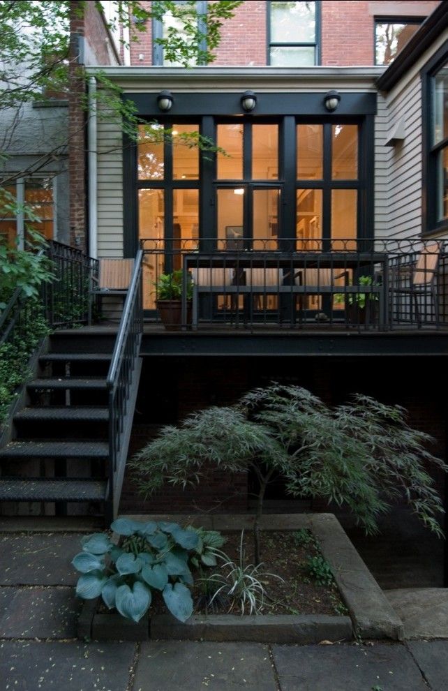 Rewiring a House for a Transitional Deck with a Deck and Brooklyn Heights Brownstone by Godwin Residential Construction