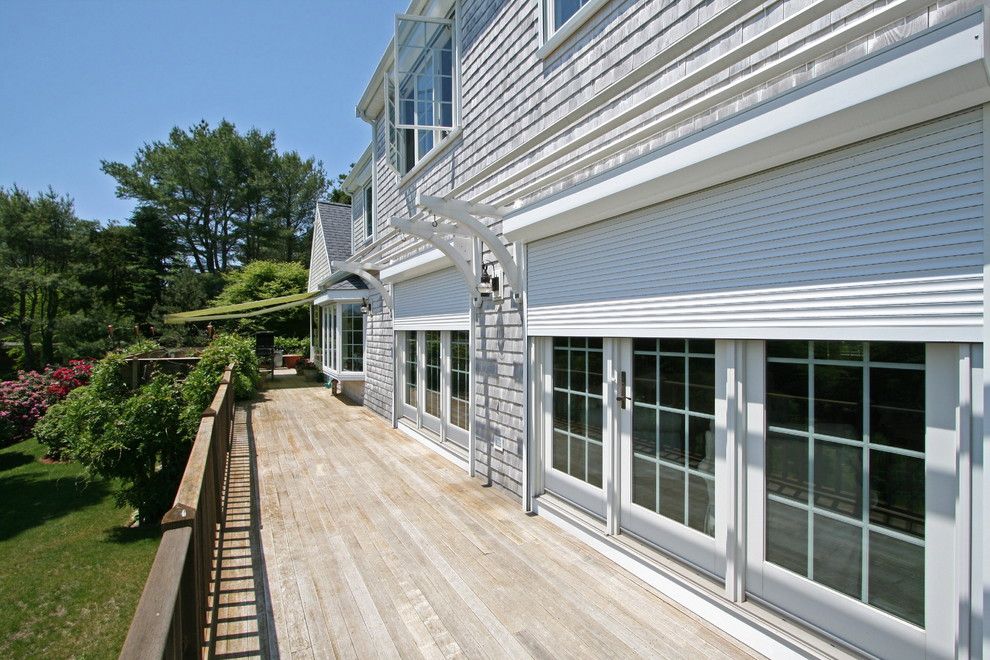 Rhino Shield Cost for a Contemporary Exterior with a Coastal Home and Rollshutters by Shade and Shutter Systems, Inc