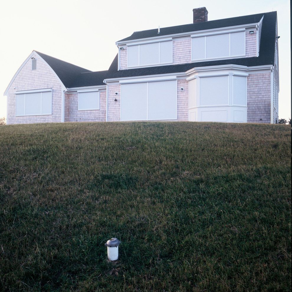 Rhino Shield Cost for a Farmhouse Exterior with a Massachusetts and Rollshutters by Shade and Shutter Systems, Inc