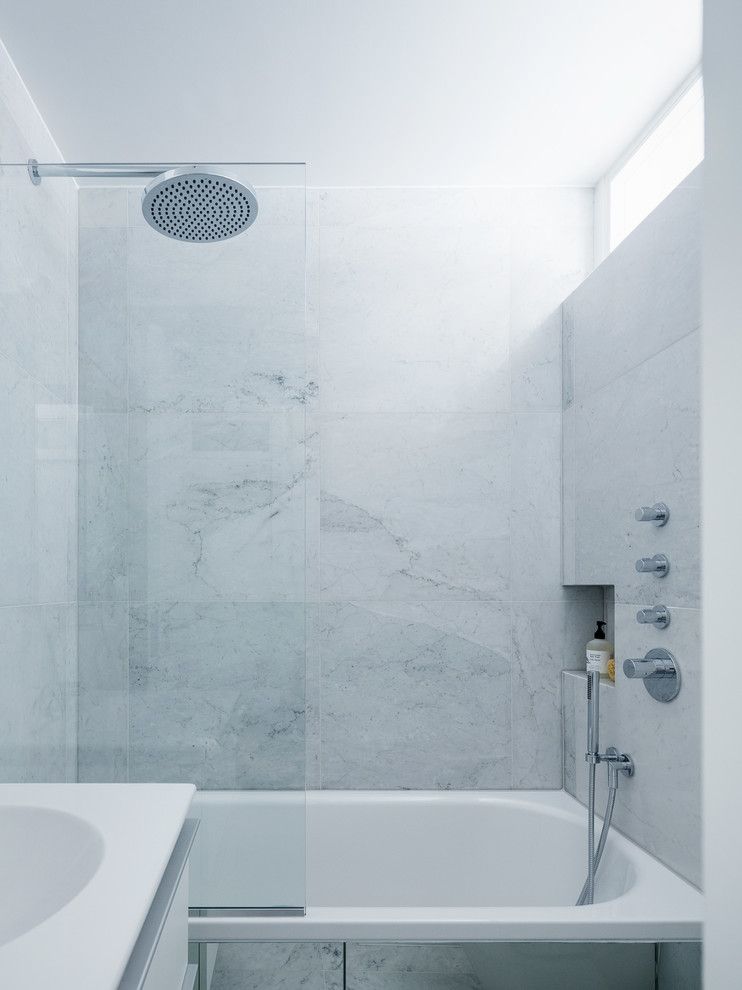 Rittenhouse Hill Apartments for a Modern Bathroom with a Glass Shower Screen and Primrose Hill Apartment by Amos Goldreich Architecture