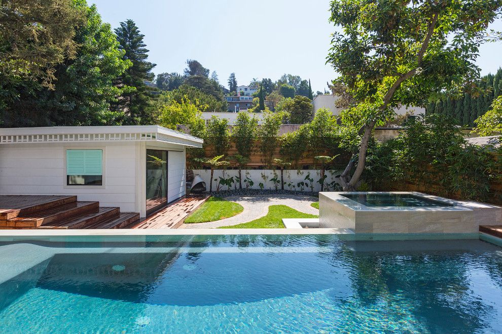 Rittenhouse Hill Apartments for a Tropical Pool with a Redwood Fence and Beachwood Drive Residence by Xanadu Group