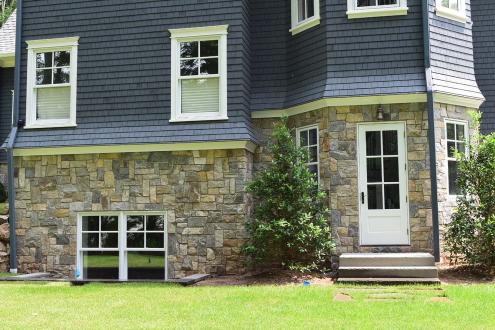 Rockland Pool for a Traditional Exterior with a Fireplace and Complementing a Newly Built Home by Braen Supply