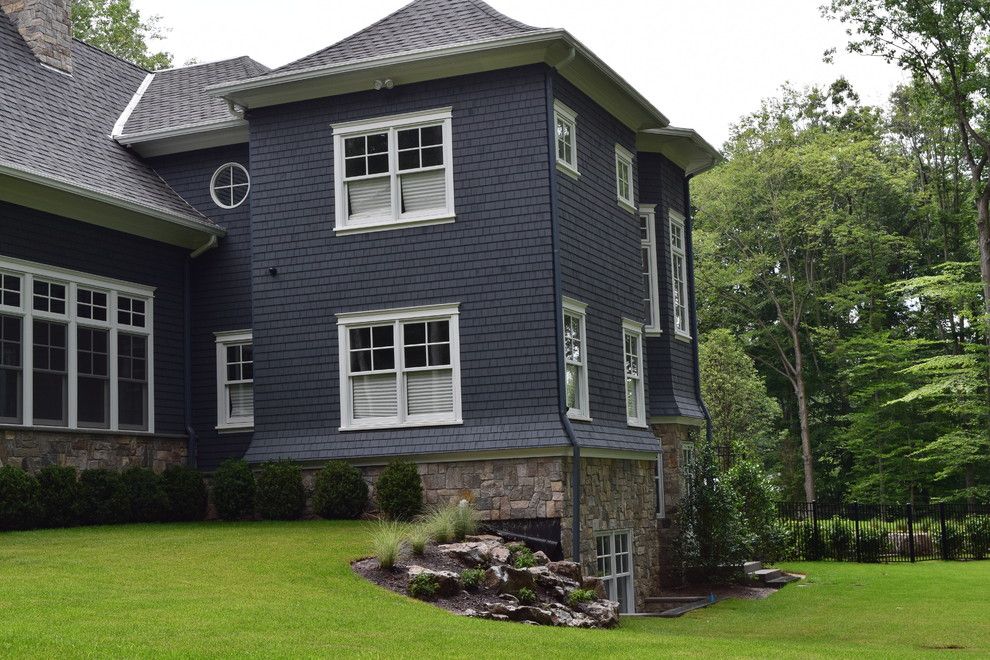 Rockland Pool for a Traditional Exterior with a Fireplace and Complementing a Newly Built Home by Braen Supply