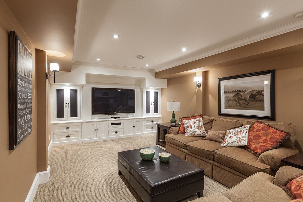 Rocky Mount Theater for a Transitional Family Room with a Built in Entertainment Center and My Houzz: Traditional Home with Cottage Flair by Becki Peckham