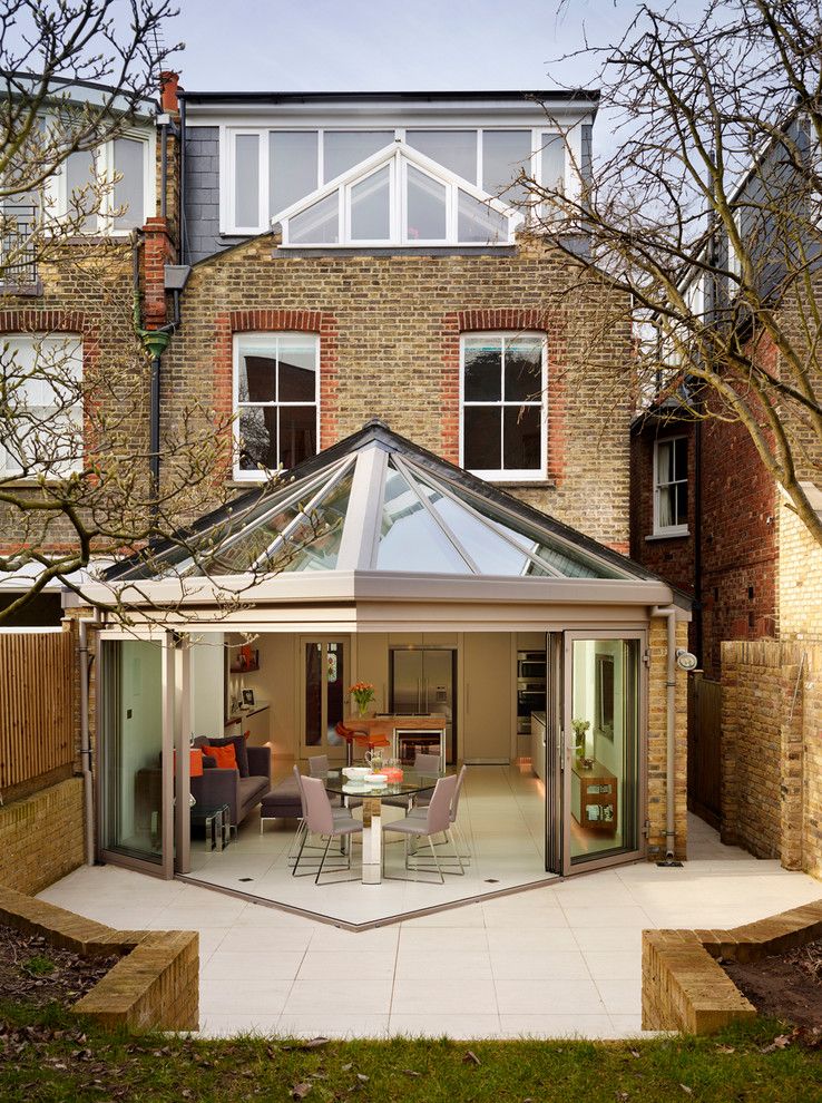 Roofs or Rooves for a Contemporary Exterior with a Flat Arches and White Bespoke Kitchen by Roundhouse