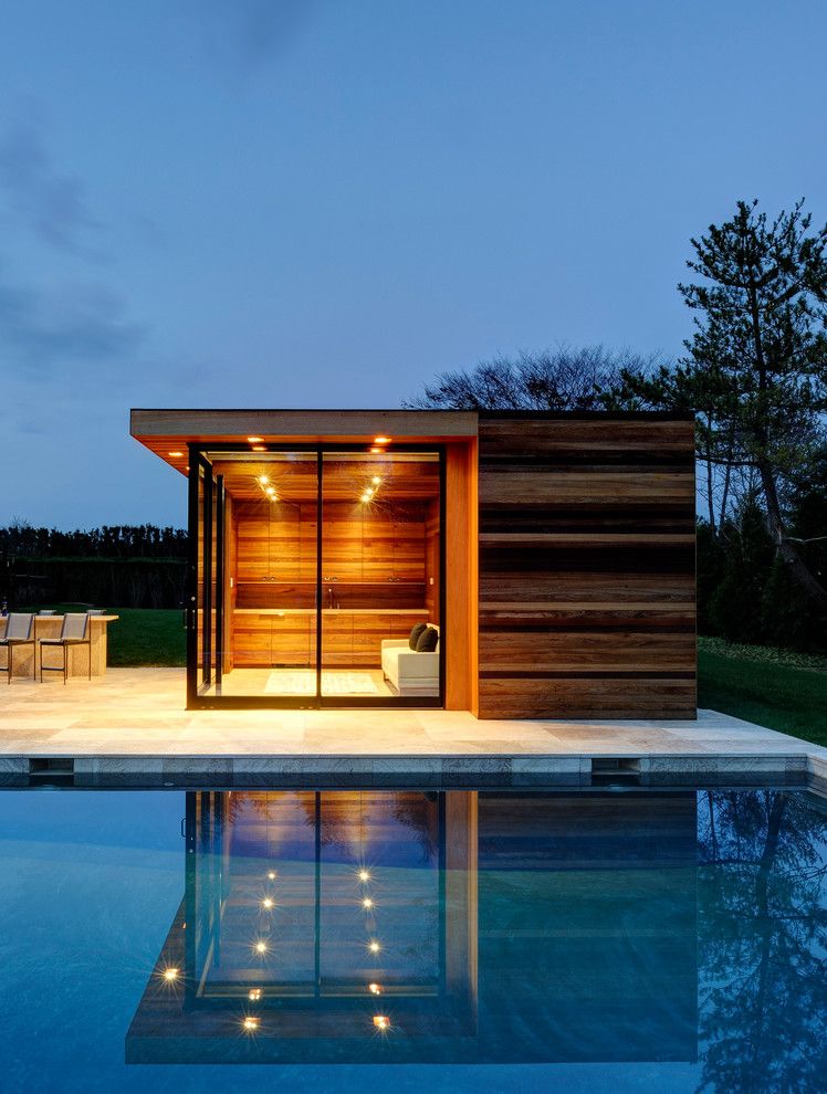 Sauna vs Steam Room for a Contemporary Pool with a Flat Roof and Sam's Creek by Bates Masi Architects Llc