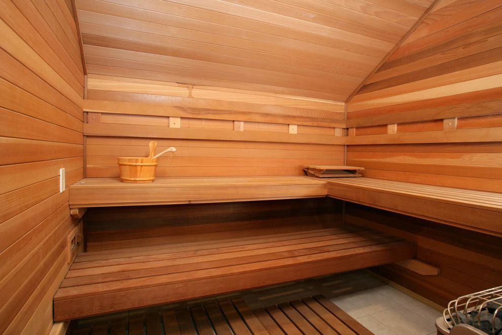 Sauna vs Steam Room for a Modern Bathroom with a Tile Floor and South End by Light House Design