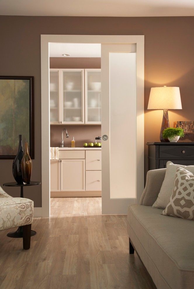 Scissor Doors for a Contemporary Living Room with a Brown Walls and Kitchen Pocket Door Series 1500 by Johnson Hardware