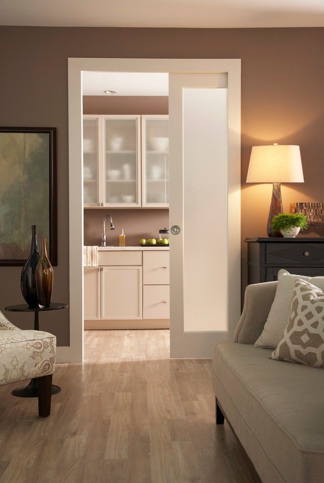 Scissor Doors for a Contemporary Living Room with a Brown Walls and Kitchen Pocket Door Series 1500 by Johnson Hardware