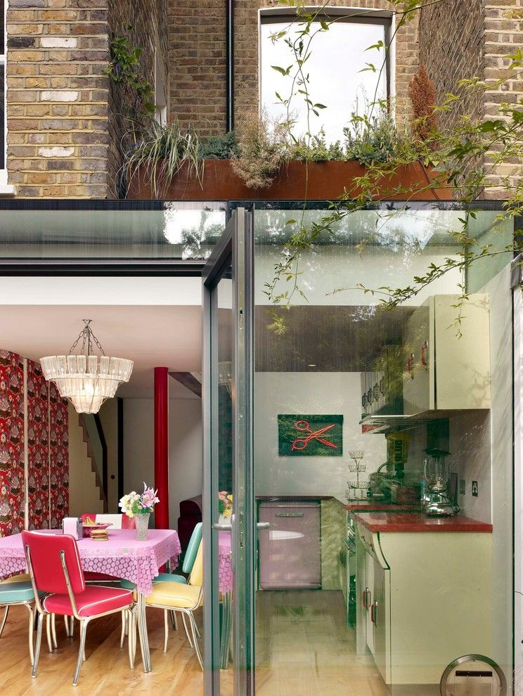 Scissor Doors for a Eclectic Exterior with a Glass Doors and Scissor House by Foster Lomas