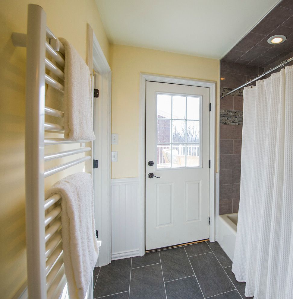 Scissor Doors for a  Spaces with a White Trim and Troy   Whole House Remodel by Razzano Homes and Remodelers, Inc.