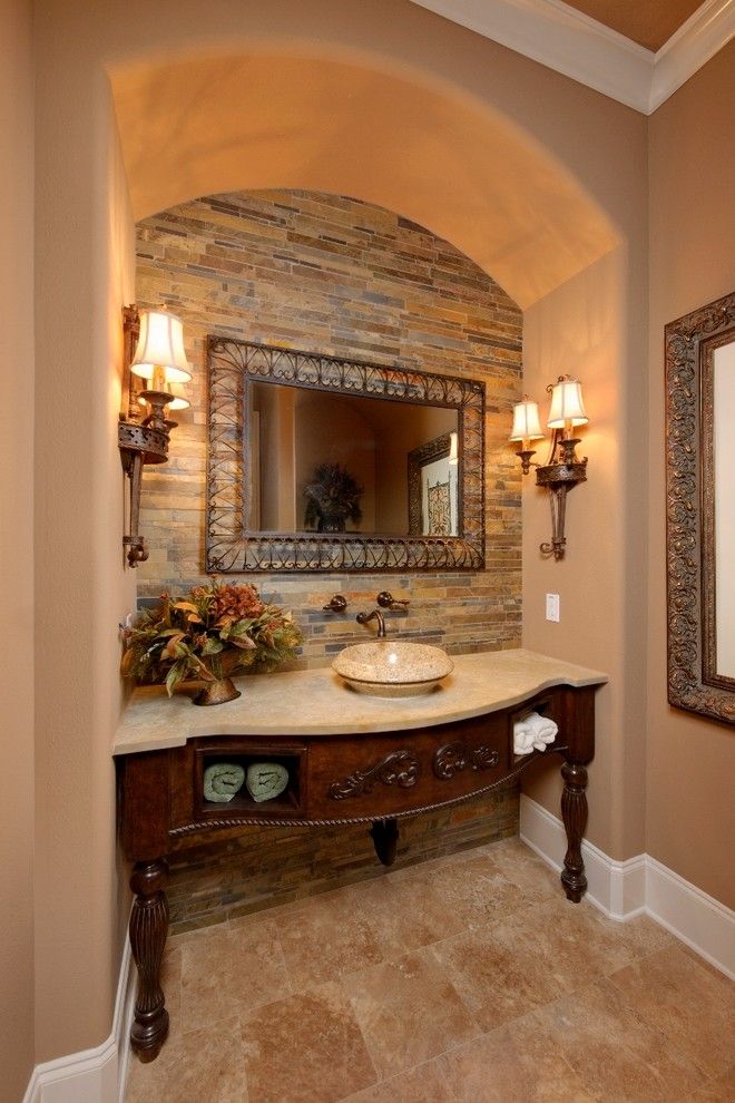 Sconce Definition for a Mediterranean Powder Room with a Wall Sconces and Wood Forest by Gary Keith Jackson Design Inc