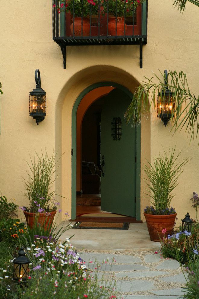 Sconces Definition for a Mediterranean Entry with a Outdoor Potted Plant and Spanish Colonial Revival in La Canada Flintridge Ca by Sue Eller of Rsir