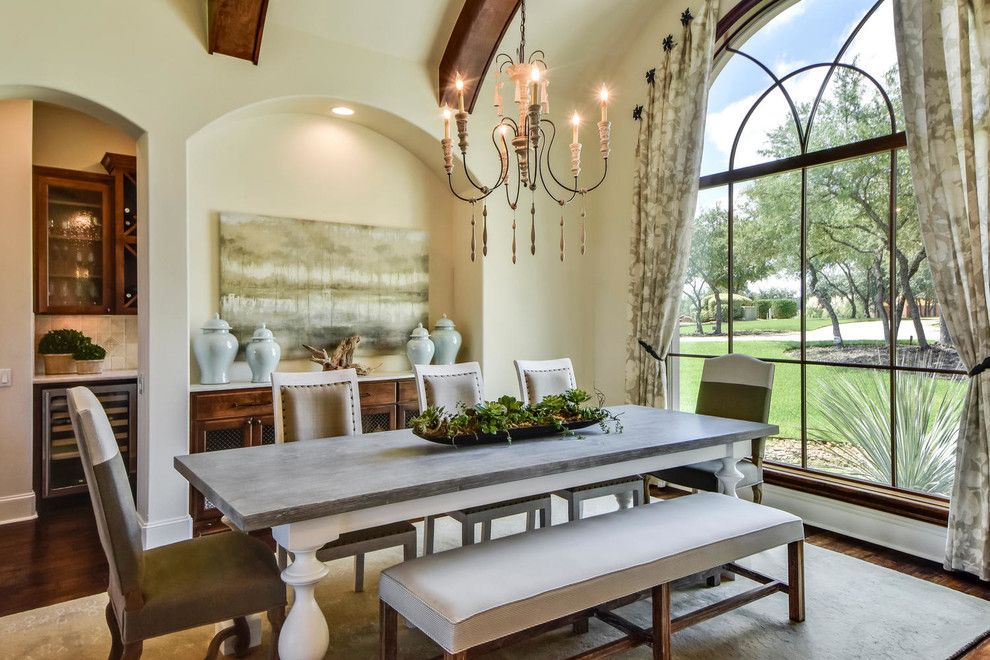 Scott Felder Homes for a Mediterranean Dining Room with a Arched Window and Zen Gardens by Heather Scott Home & Design