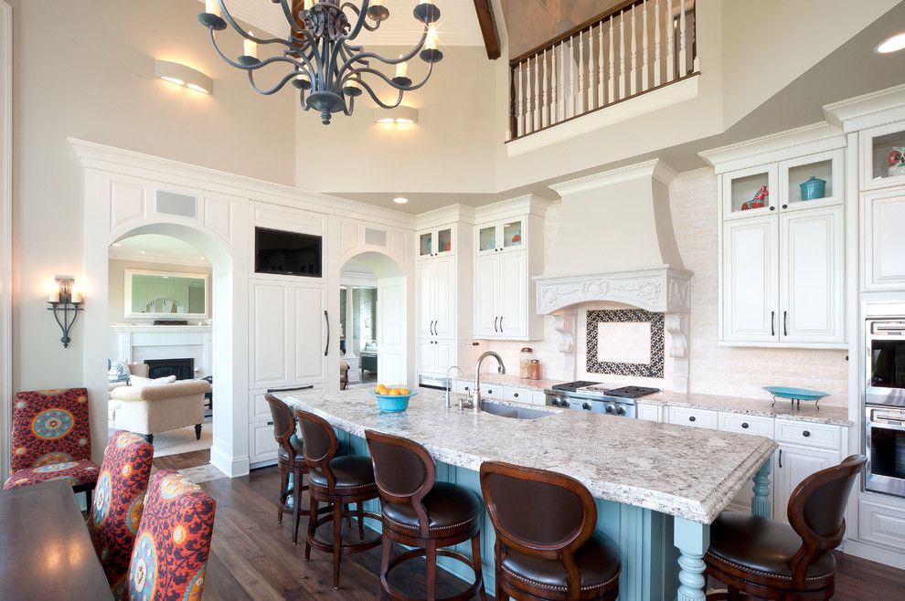 Scott Felder Homes for a Traditional Kitchen with a Suzani and Medina Luxury Home by Schrader & Companies