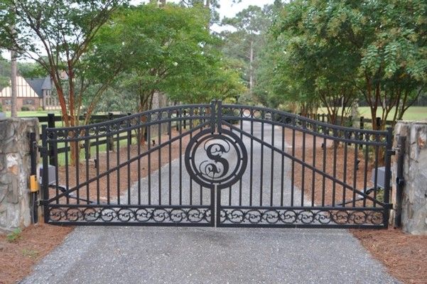 Seegars Fence for a  Exterior with a Ornamental Gate and Our Fences by Seegars Fence Company