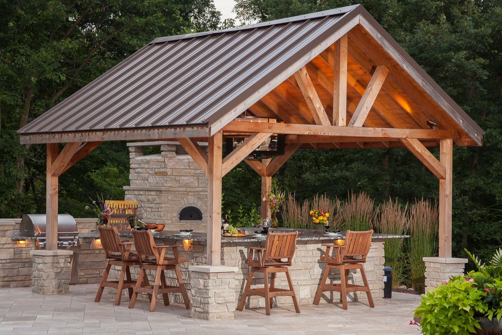 Self Serve Lumber for a Traditional Patio with a Hardscape and Fiberglass Swimming Pool Installation Near Rockford, Il by Sonco Pools & Spas