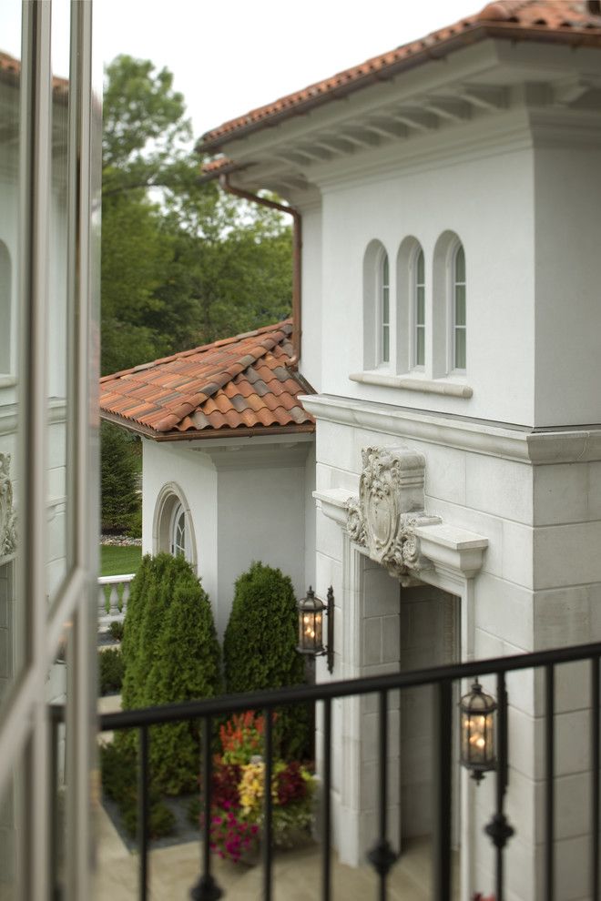 Shingles in Spanish for a Mediterranean Exterior with a Mediterranean and Front Courtyard by John Kraemer & Sons