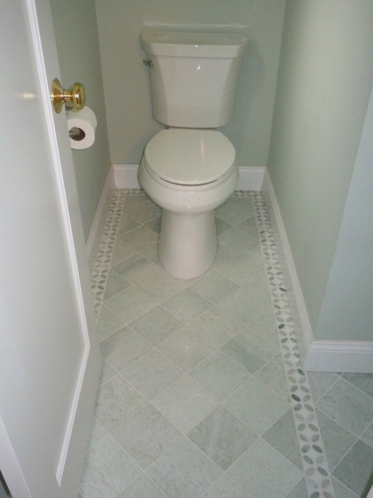 Shoshana for a Transitional Powder Room with a Mosaic Border and Bathrooms by Shoshana Halpert Designs