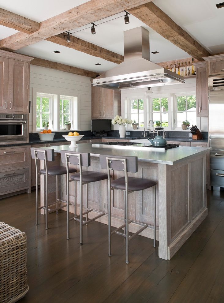 Siesta4rent for a Beach Style Kitchen with a Kitchen Island and Darien Beach House by Shelter Interiors Llc