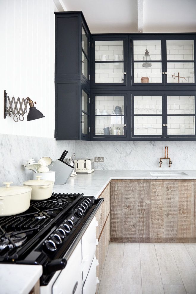 Sightline for a Scandinavian Kitchen with a Glazed Cabinets and Industrial Chic by Blakes London