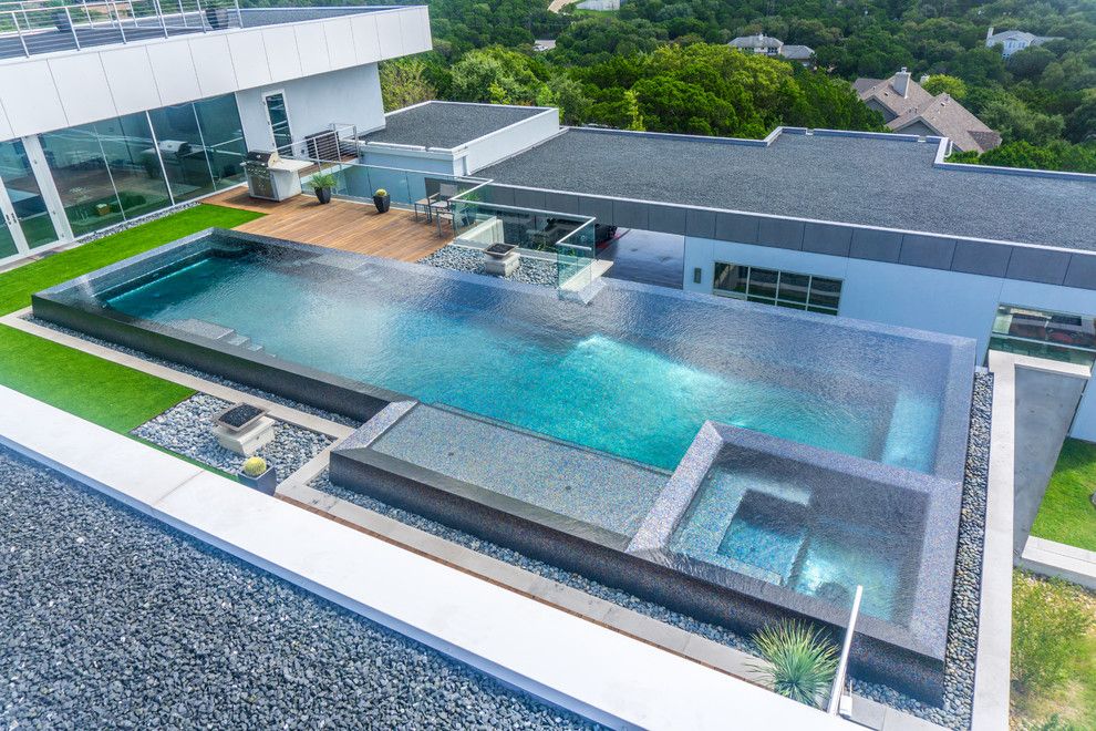 Simply Austin Furniture for a Modern Pool with a Gorgeous Pool and West Lake Hills Infinity Edge Pool & Decks (Ipe, Cable Railing) by Timbertown