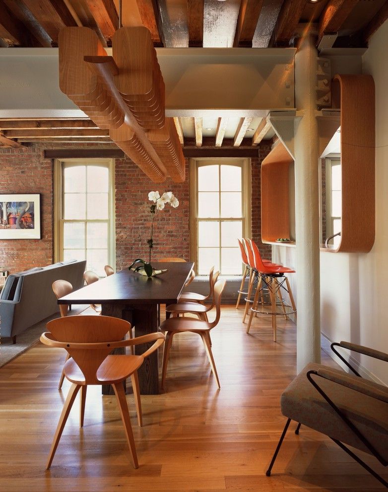 Single Hung vs Double Hung for a Modern Dining Room with a Wood Dining Table and Manhattan Loft by Barliswedlick Architects