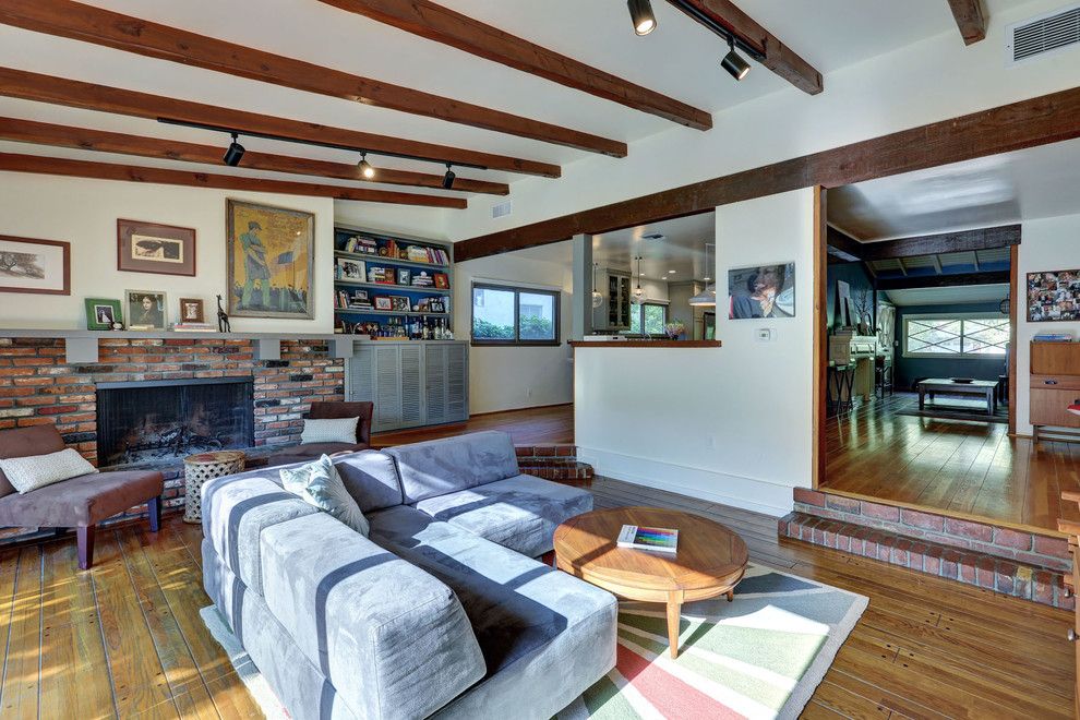 Sioux City Brick for a Midcentury Family Room with a Warm Modern and Modern Ranch House in Studio City by Natasha Jansz Design