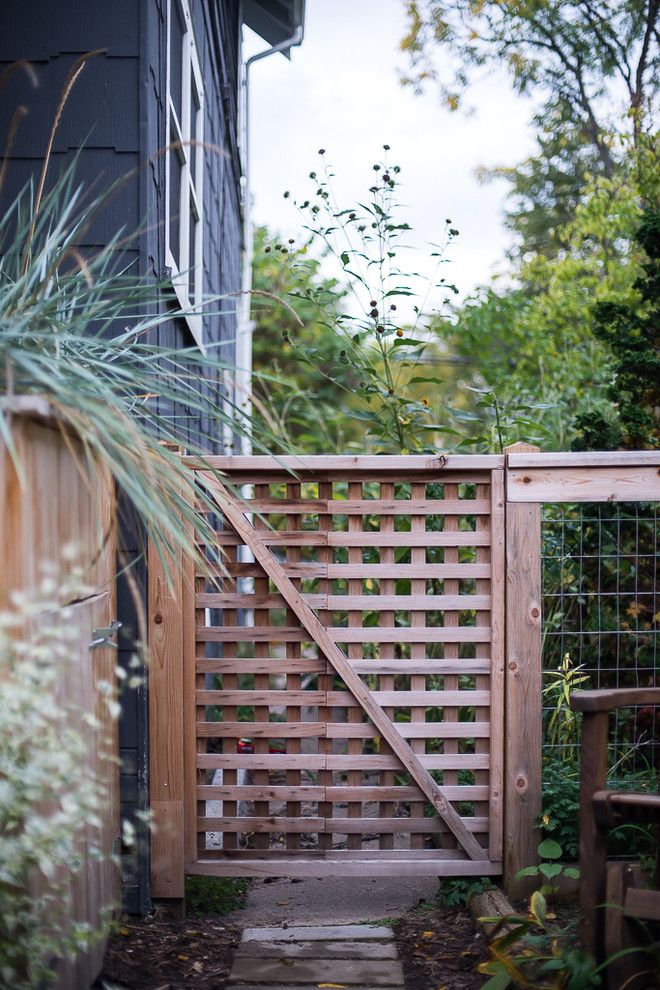 Sloat Garden Center for a Traditional Landscape with a Wood Fence and Cozy Backyard Family Space by Lotus Gardenscapes & Bloom Garden Center