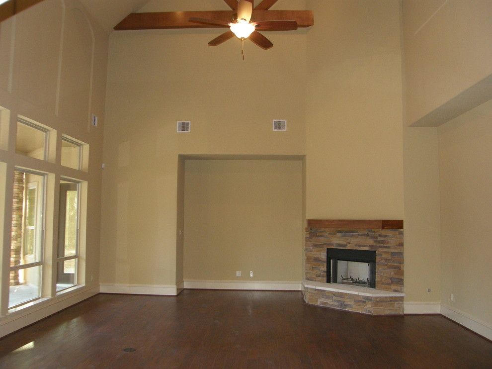 Slumberland Cedar Rapids for a Traditional Family Room with a Vaulted Ceilings and Maple Rapids by Refined Custom Builders