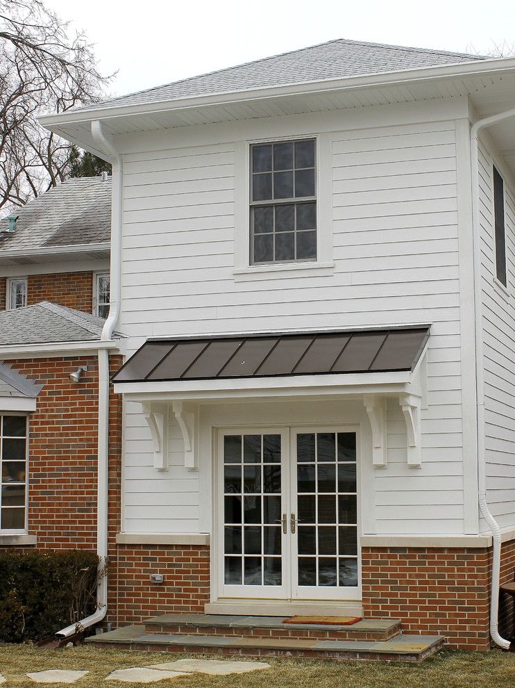 Smalls Chicago for a Traditional Exterior with a White Siding and Exterior Addition by Great Rooms Designers & Builders