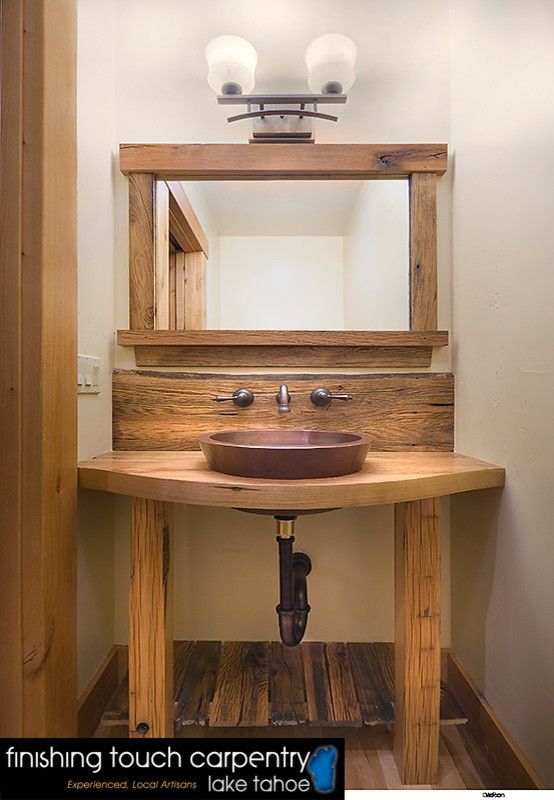 Snowcrest for a Rustic Bathroom with a Wood Bathroom and Interiors // Snowcrest House // Alpine Meadows, Ca by Finishing Touch Carpentry