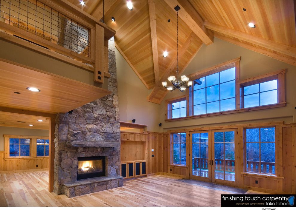 Snowcrest for a Rustic Living Room with a Stone Mantels and Interiors // Snowcrest House // Alpine Meadows, Ca by Finishing Touch Carpentry