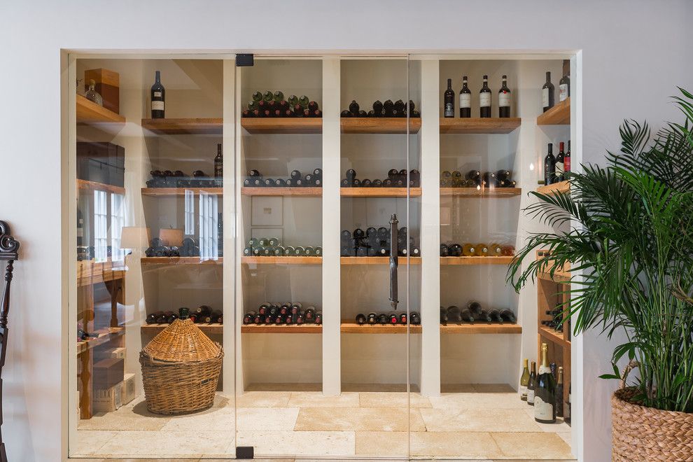 Soss for a Contemporary Wine Cellar with a China Cabinet and Point Clear Plantation by Cdc Woodworking