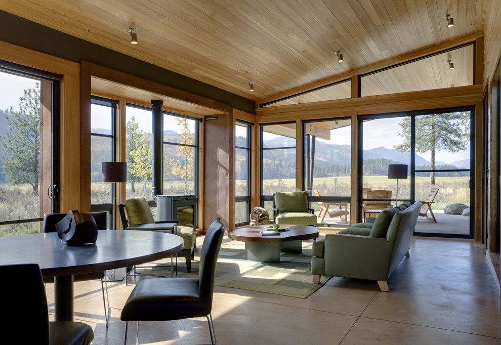 Southern Crushed Concrete for a Modern Living Room with a Knotty Pine and Wolf Creek by Prentiss Balance Wickline Architects