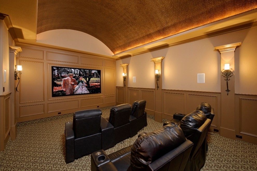 Southlake Movie Theater for a Mediterranean Home Theater with a Black Leather Armchairs and Wood Forest by Gary Keith Jackson Design Inc