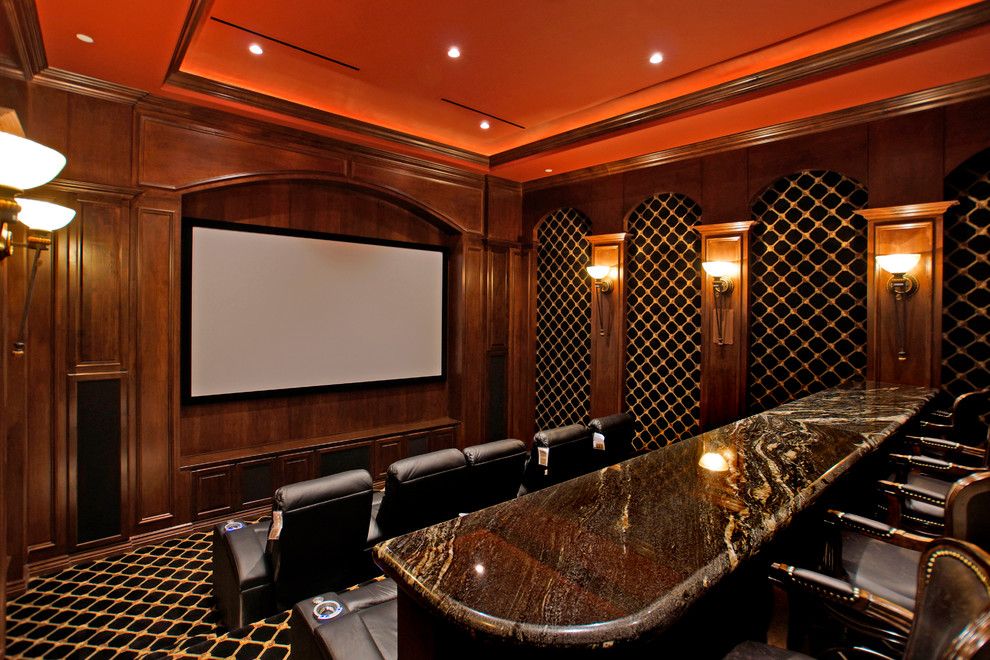 Southlake Movie Theater for a Mediterranean Home Theater with a Tray Ceiling and Mediterranean Home Theater by Lvpas.com
