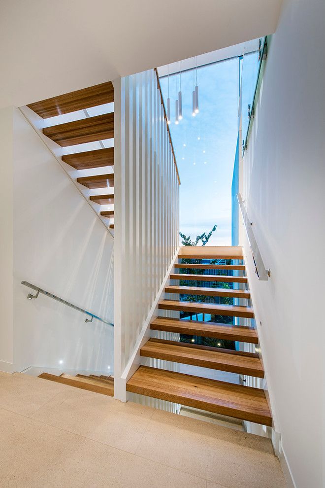 Sparkle Pools for a Modern Staircase with a Cambuild and City Beach by Cambuild