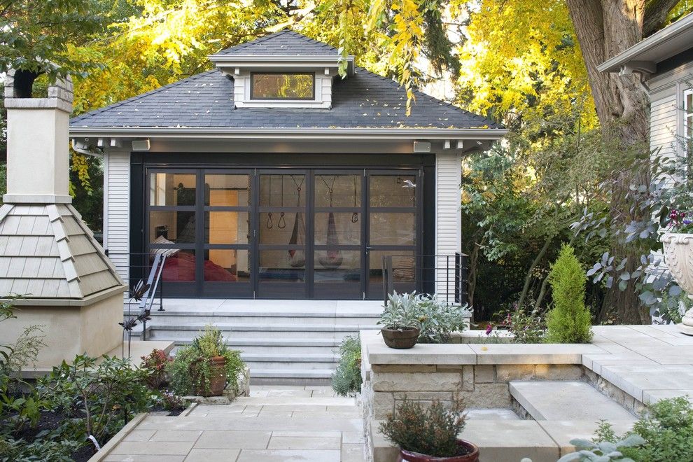 Specialty Coating Systems for a Traditional Shed with a Landscaping and Garage Renovated for Family Play by Menter Byrne Architects