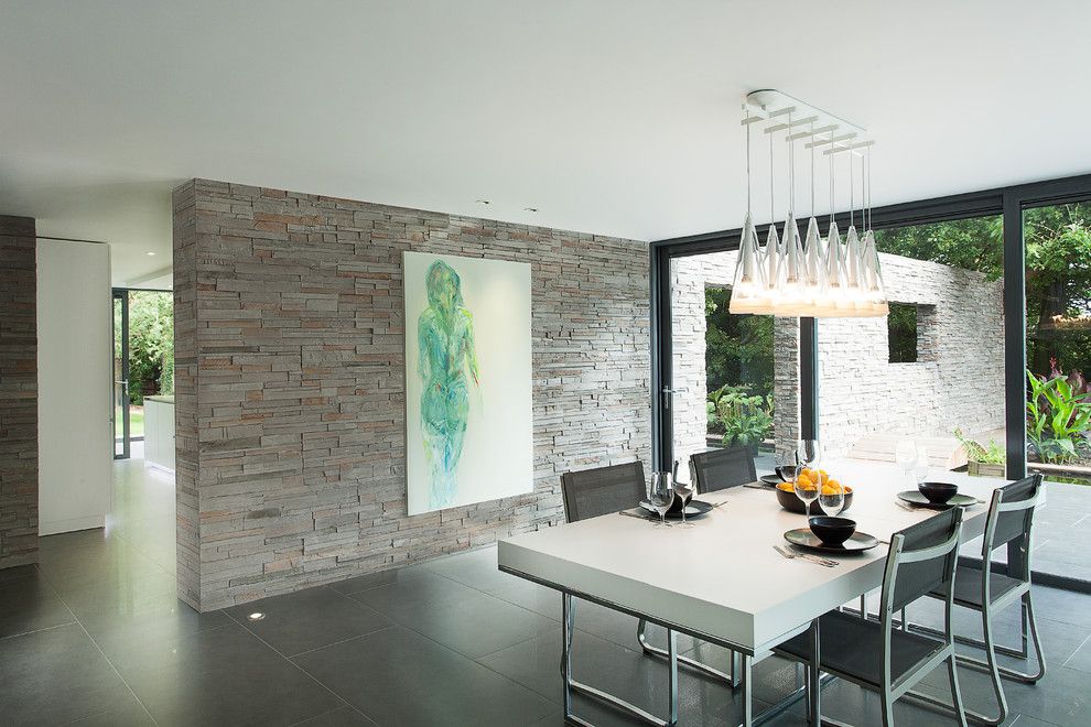 Spectra Contract Flooring for a Modern Dining Room with a Pendant Chandelier and Abbots Way by Ar Design Studio Ltd