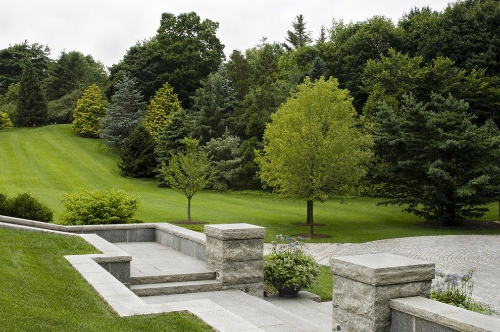 Spring Cleaning Checklist for a Traditional Landscape with a Sloping Garden and Classic Home and Landscape by R. P. Marzilli & Company Landscape Contractor