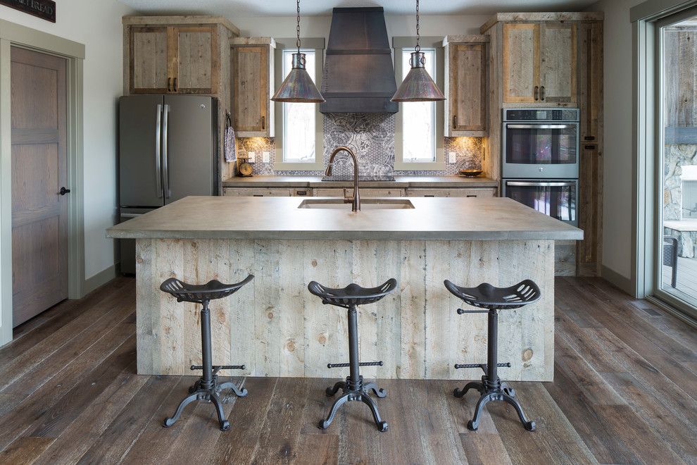 St Croix Theater for a Rustic Kitchen with a Barn Wood Cabinetry and St Croix Trail by Hartman Homes